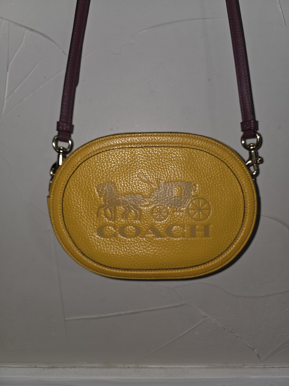 COACH Yellow Pebbled Leather Oval Crossbody Bag with Purple Strap